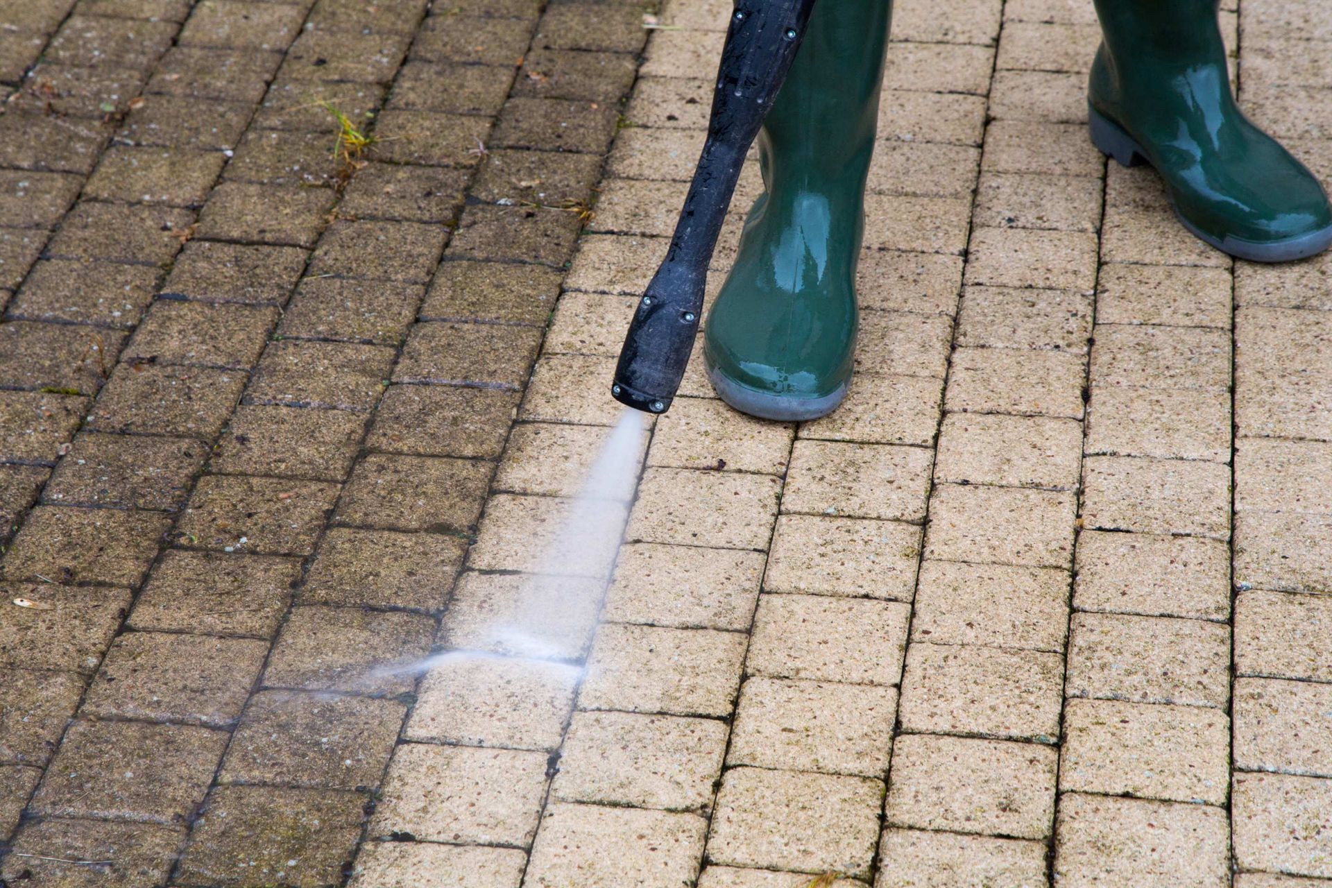 a pressure washer is used to clean off stains and dirt the stamped concrete surface