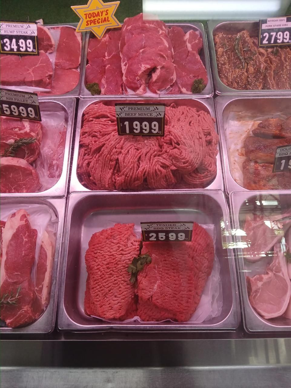 A Variety of Meats Are on Display in a Butcher Shop — Multy Cut Meats In Yorkeys Knob, QLD