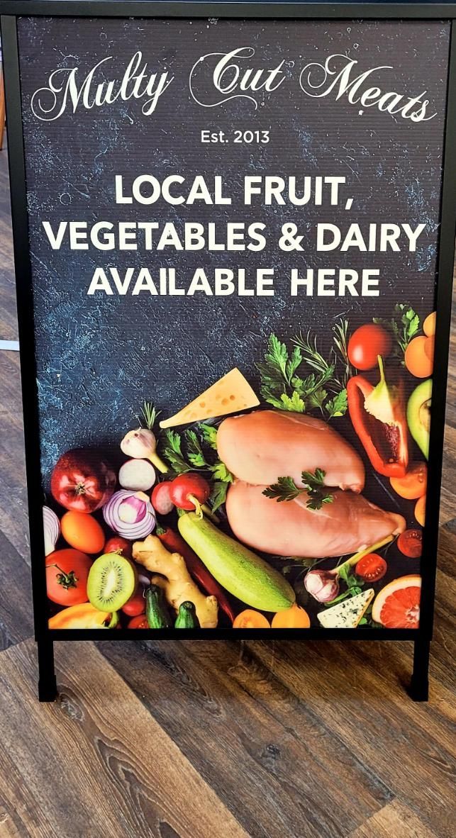 A Sign That Says `` Local Fruit , Vegetables and Dairy Available Here '' — Multy Cut Meats In Yorkeys Knob, QLD
