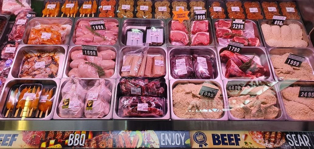 A Variety of Meats Are Displayed in a Butcher Shop — Multy Cut Meats In Yorkeys Knob, QLD