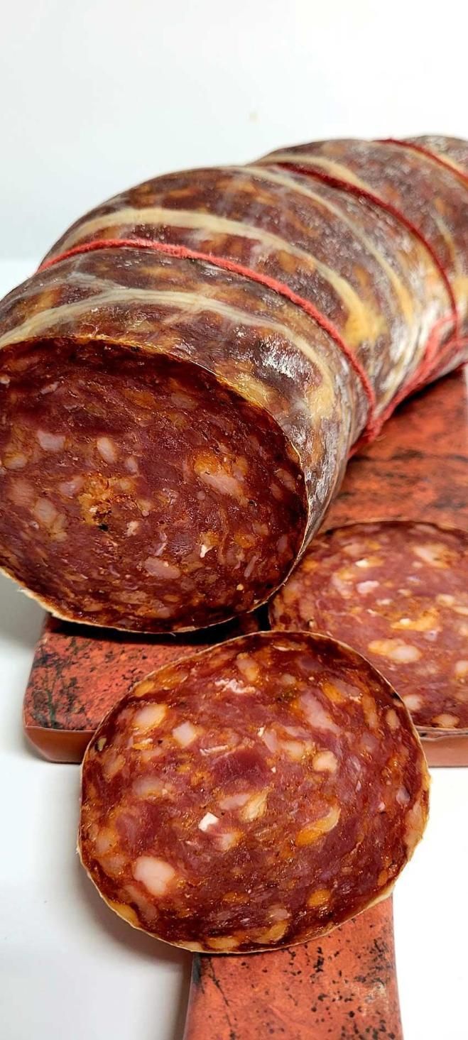 A Close Up of a Sliced Sausage on a Table — Multy Cut Meats In Yorkeys Knob, QLD