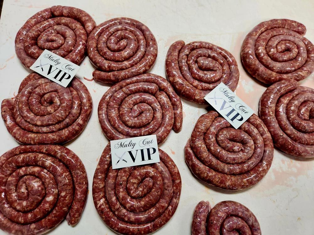 A Bunch of Sausages With Labels That Say Vip on Them — Multy Cut Meats In Yorkeys Knob, QLD