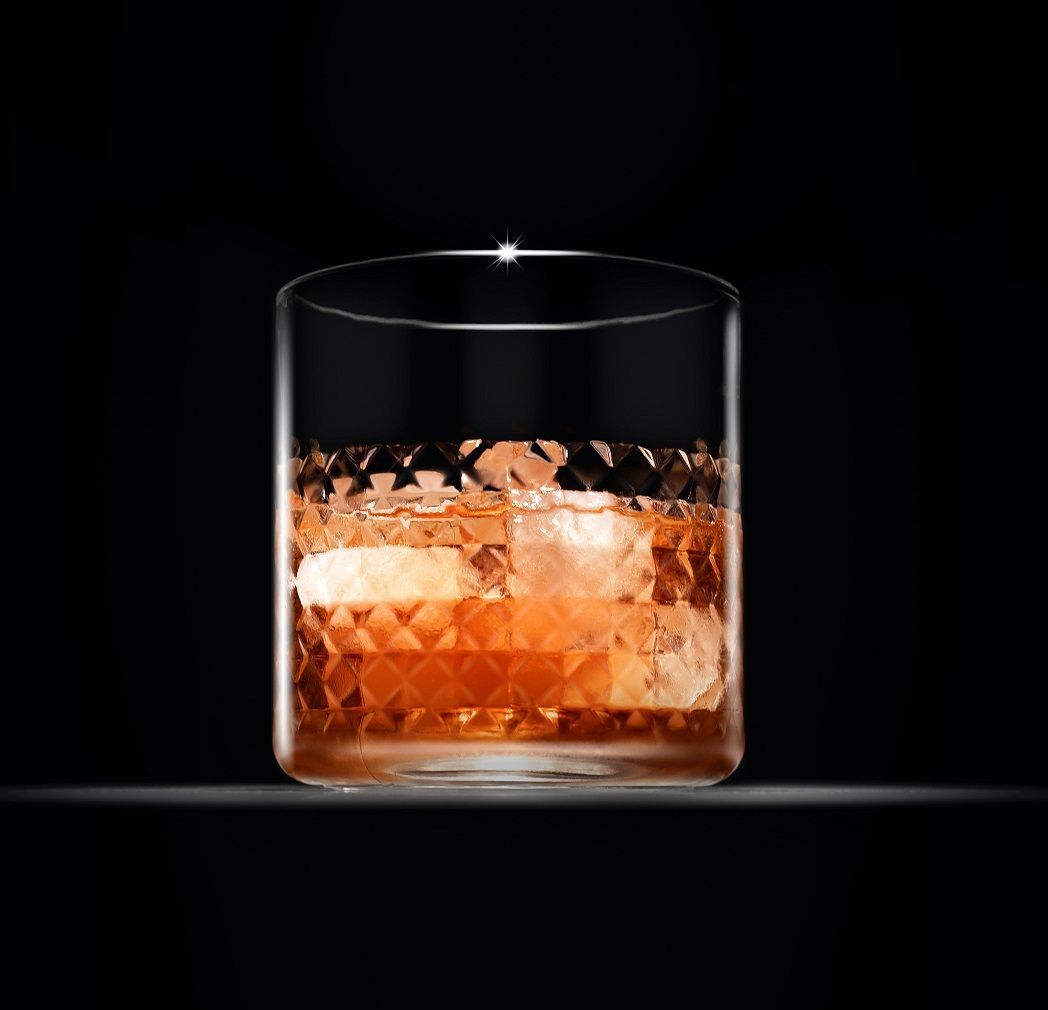 A group of people are sitting in a circle in a room.