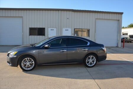 Window Film Professional — Window Film Professional of a Black Car in Lewisville, Texas