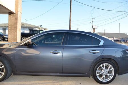 Professional Film Window — Professional Film Window of a Silver Gray Car in Lewisville, Texas