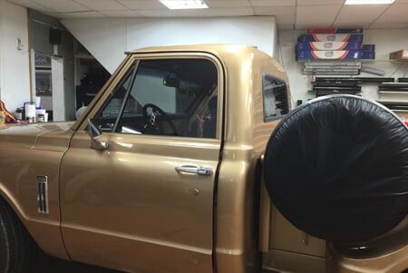 Tint Professional Window — Tint Professional Window of a Gold Car Truck in Lewisville, Texas