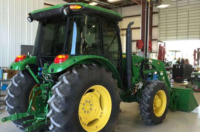 Film Window Truck Shop — Film Window of a Green Truck in Lewisville, Texas
