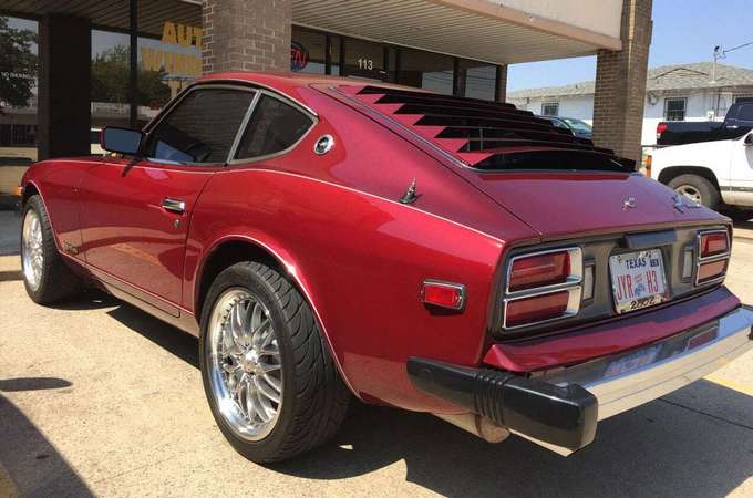Tint Car Shop Window — Tint of a Red Car Window in Lewisville, Texas