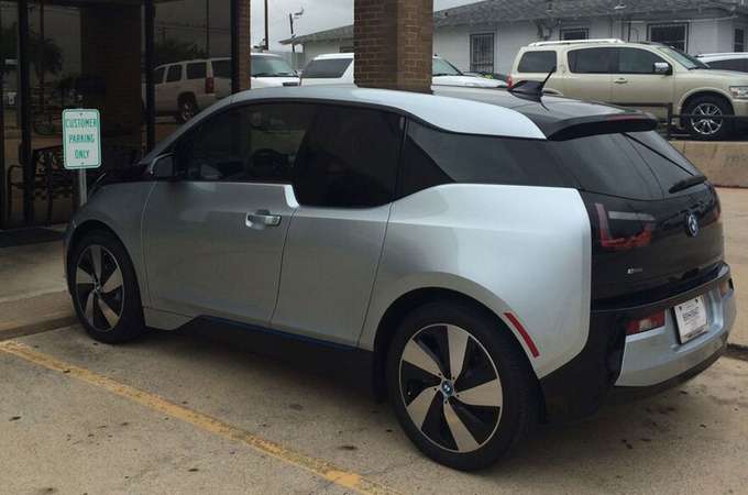 Tint Window Shop — Tint Window Shop of a White Car in Lewisville, Texas