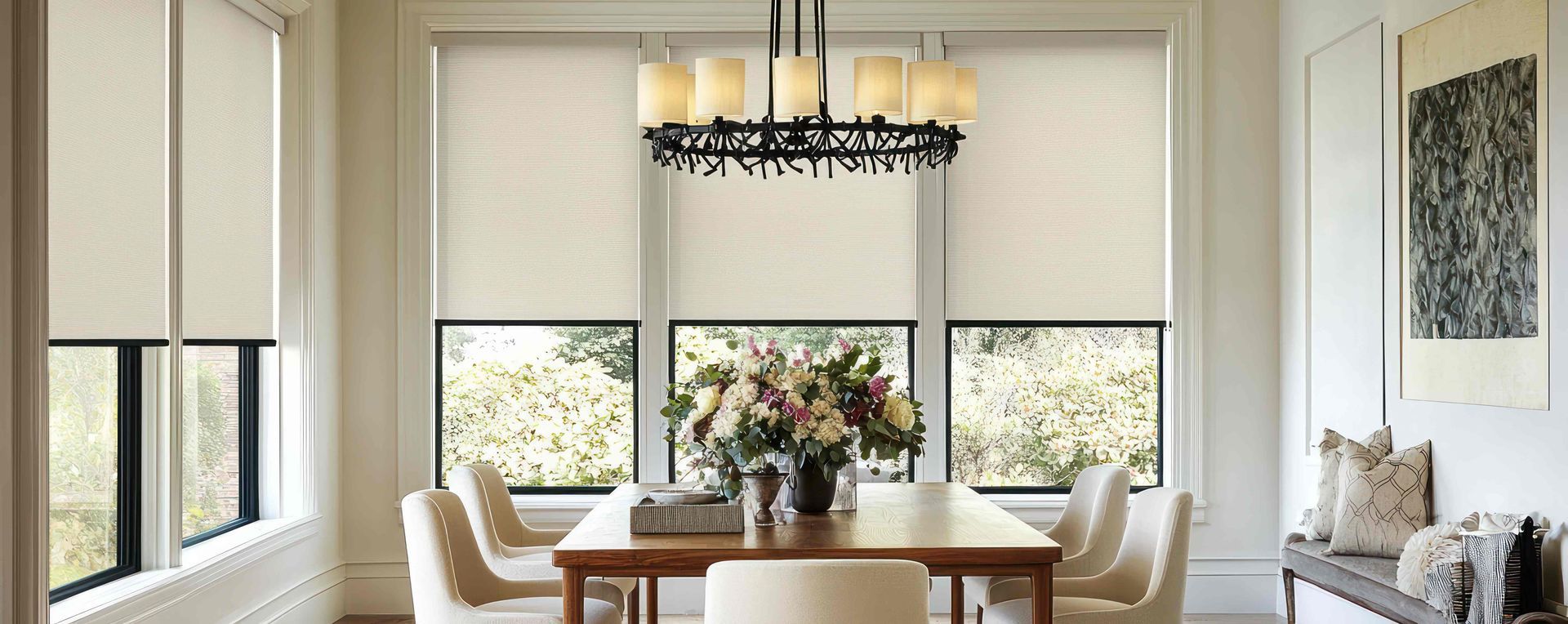 A modern minimalist dining room with shades for the windows near Greenville, SC
