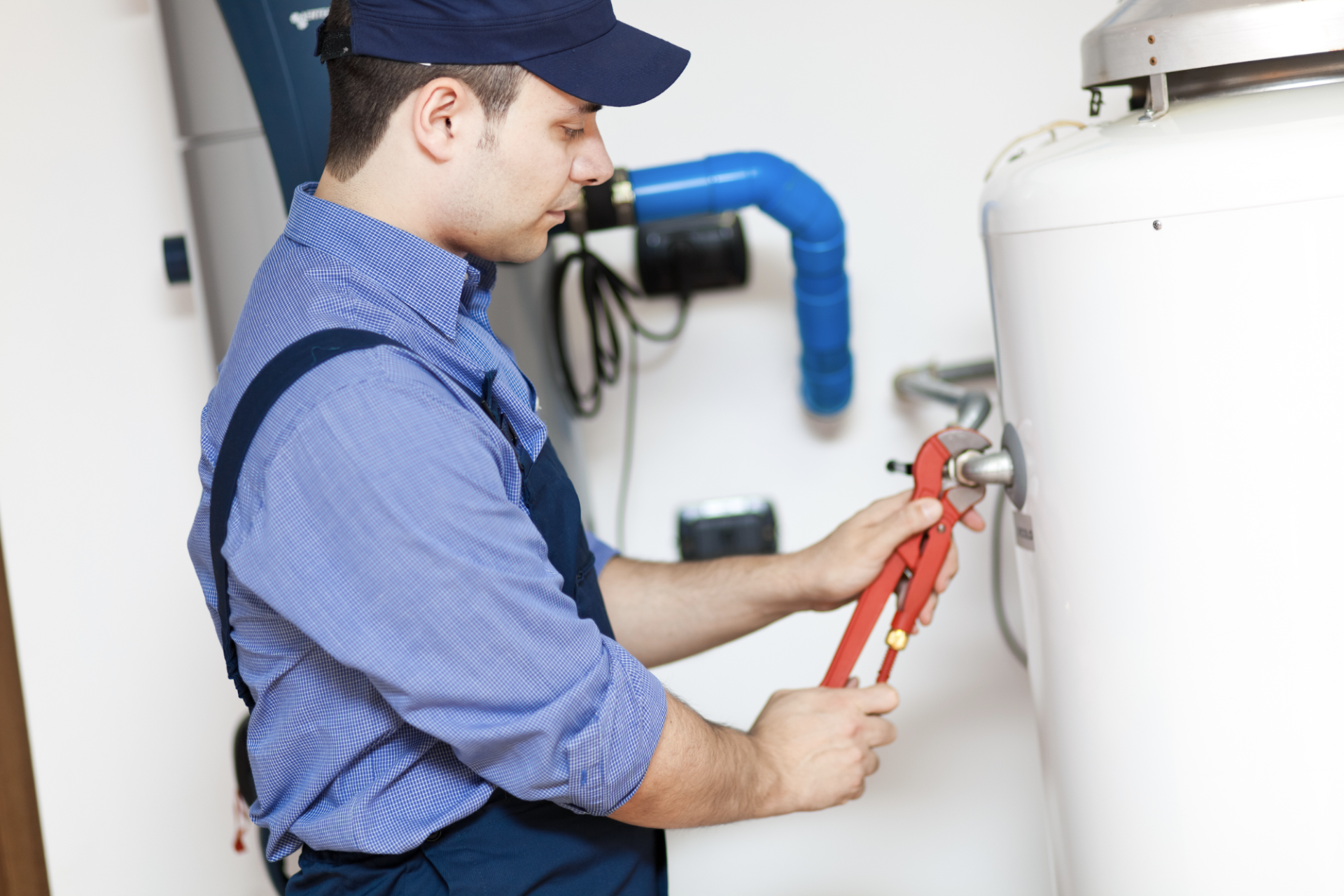 Plumber installing a new water heater - bluefrog Plumbing + Drain Cleaning of Northwest Houston