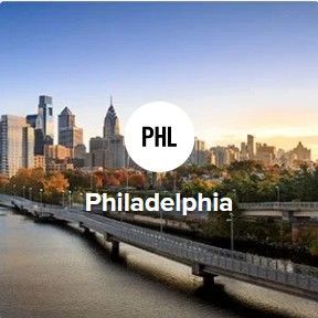 Philadelphia skyline with the letters "PHL" in a circle.