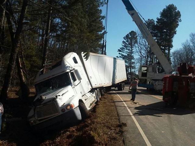 Machinery Rigging — Mobile Crane Truck Lifting a Truck in Monroe, NC
