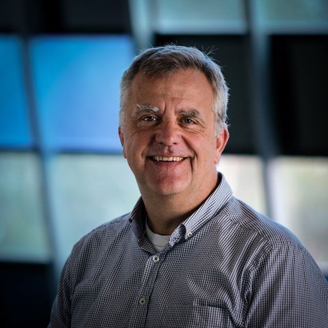 Silhouette of a person, solid gray against a white background.