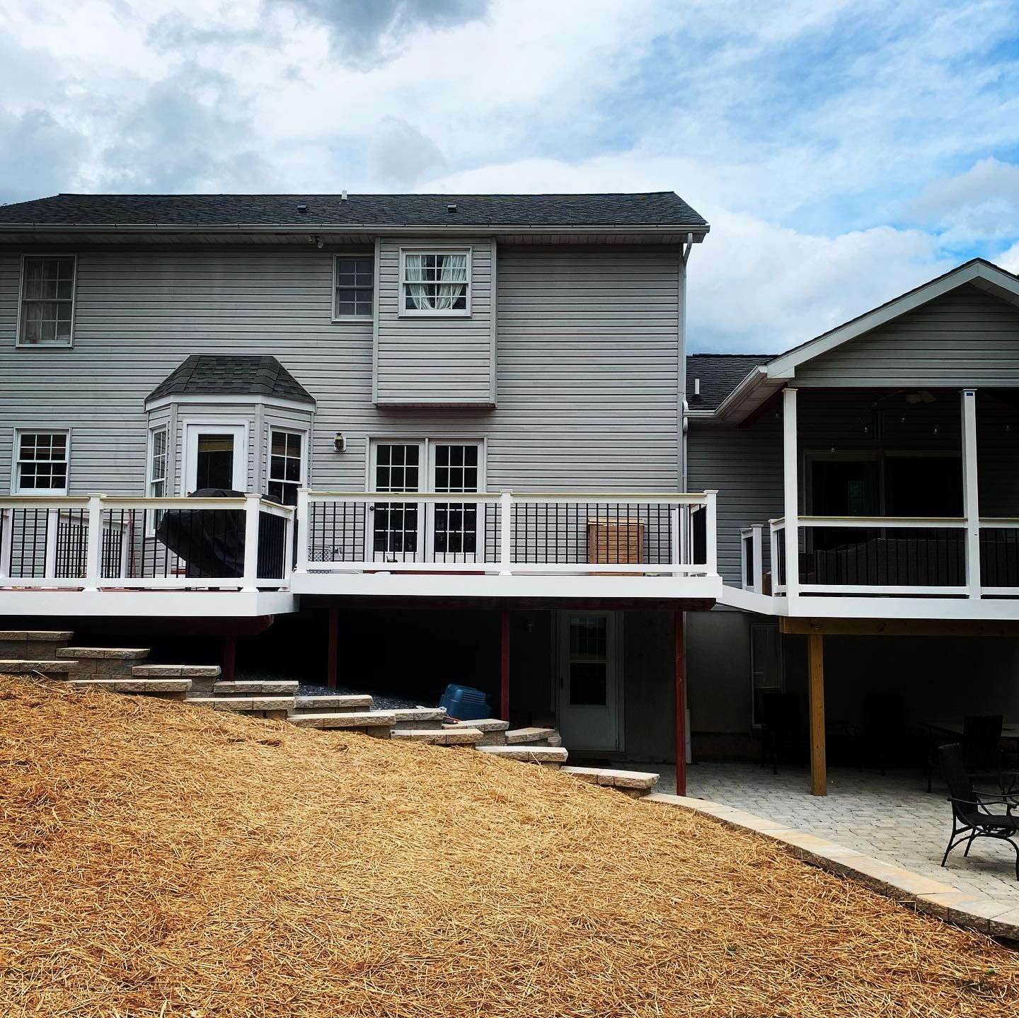 The back of a house with a large deck