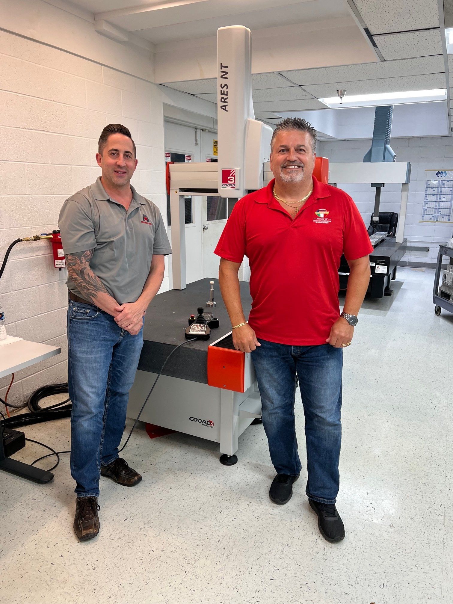 Bryan Friesz, Owner of Accurate CMM Services LLC with client.
