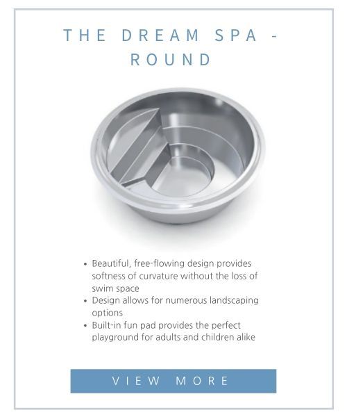 A round, silver-colored spa shell featuring a built-in step and fun pad.