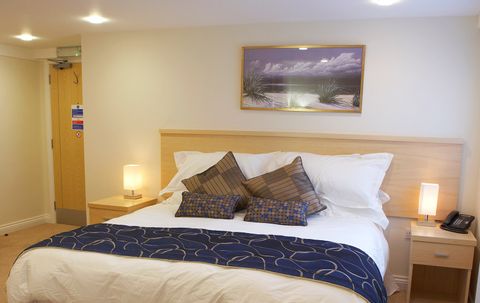 A bedroom in the best hotel for stays in Horsham
