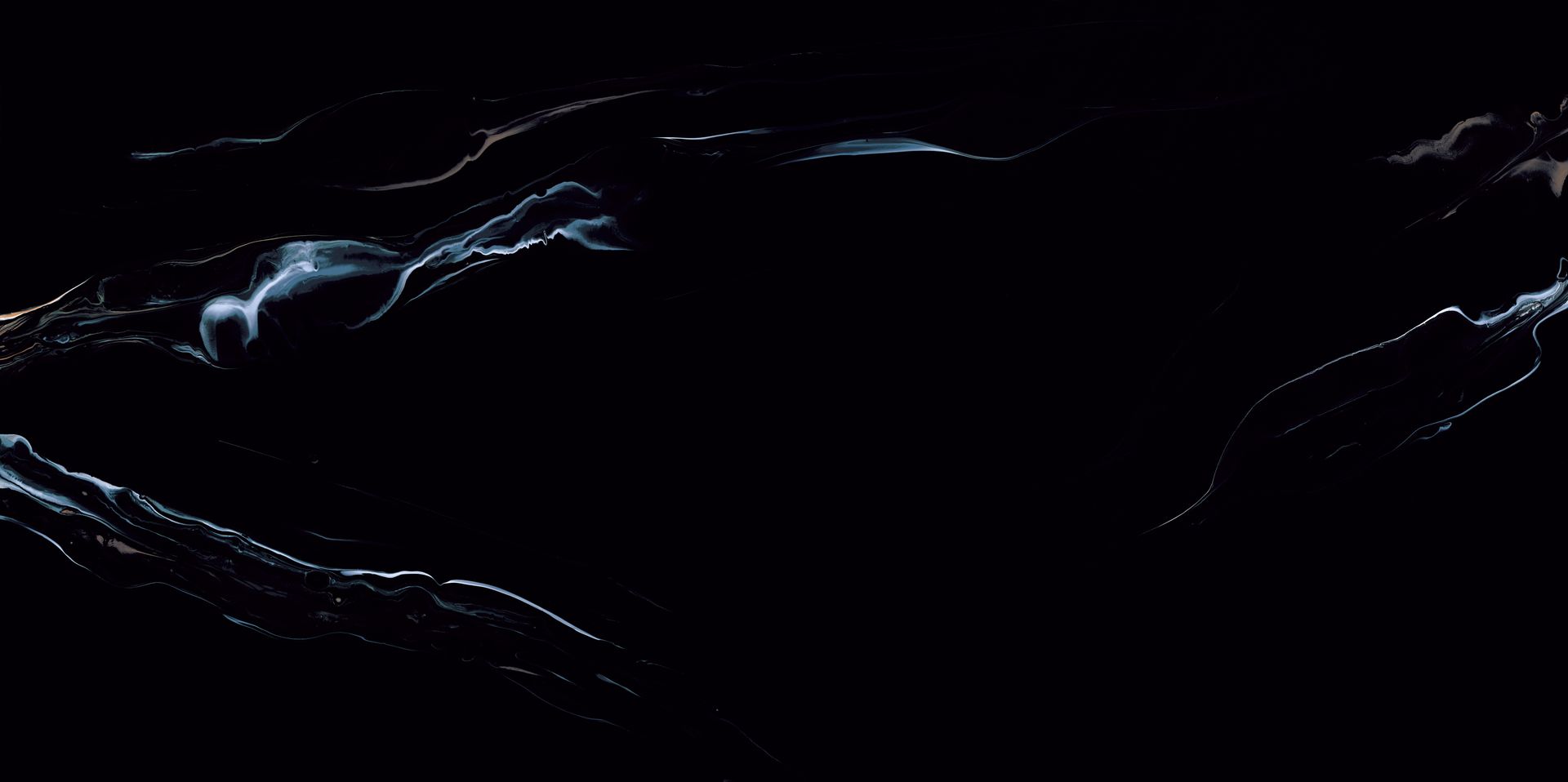 Abstract image of white lines on black background, possibly smoke or water.