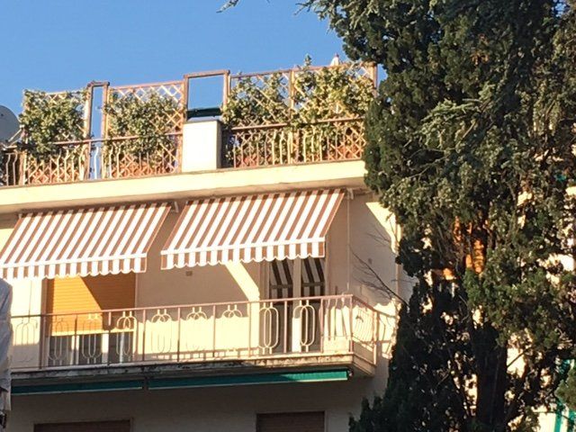 tenda da sole per ingresso