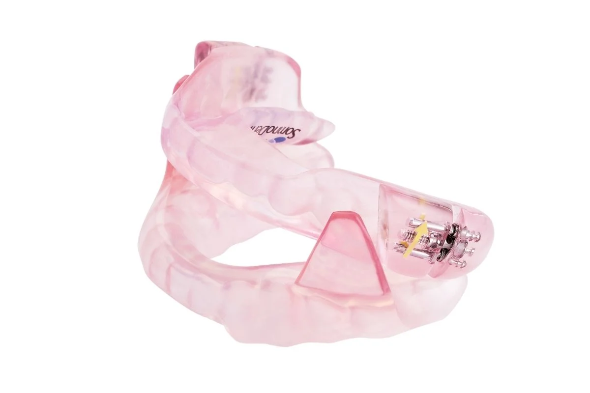 Pink, Translucent, Dental Appliance for Treating Sleep Apnea — Barry Bennett Dental In Earlville, QLD