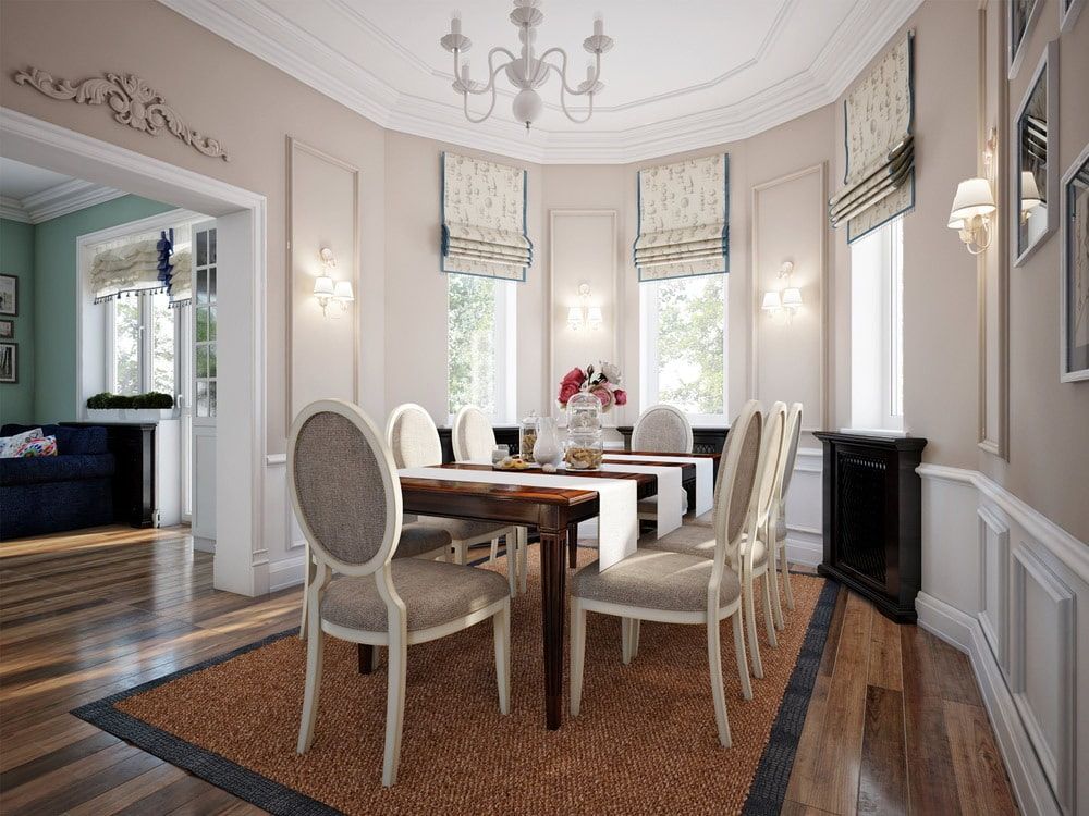 A Dining Room With A Table And Chairs And A Fireplace — Bay Blinds & Doors in Bateau Bay, NSW
