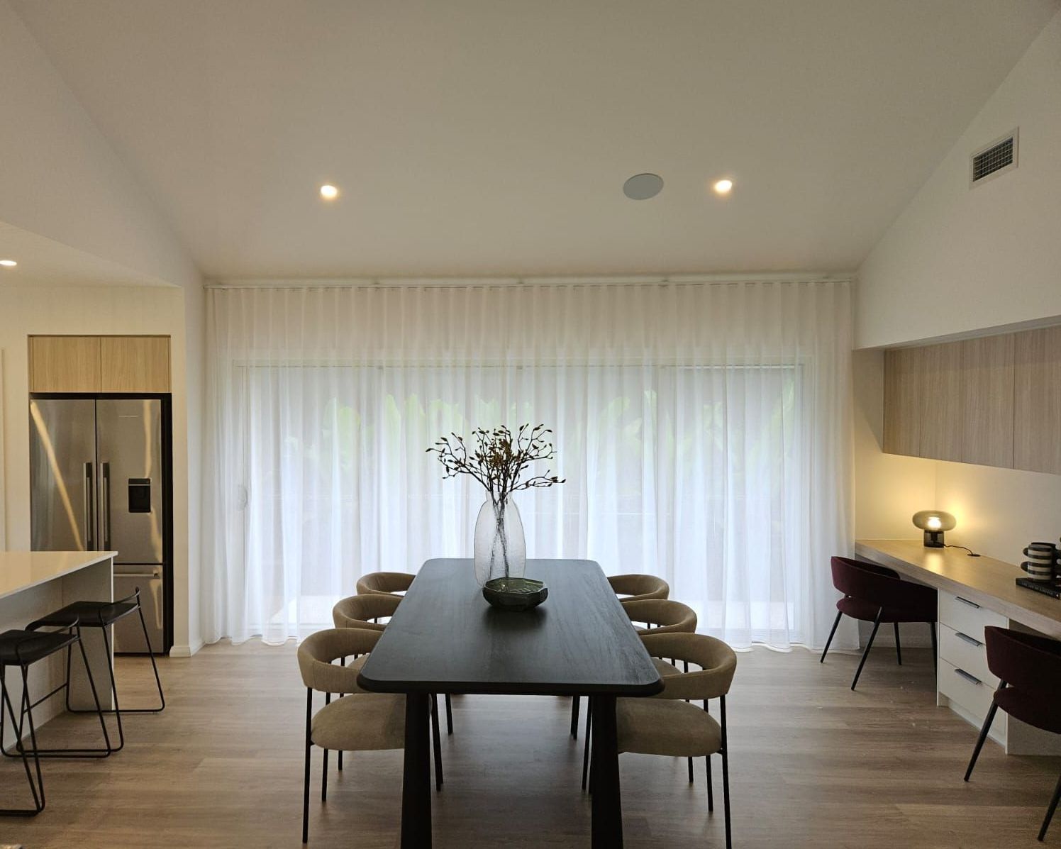 A House with A Swimming Pool in The Backyard — Bay Blinds & Doors in Bateau Bay, NSW