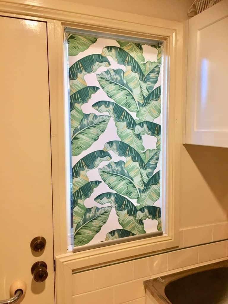 A Window With a Leafy Pattern on it in a Kitchen - Bay Blinds & Doors in Lake Charmhaven, NSW