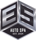 Logo for ES Auto Spa, metallic silver letters on black hexagonal base.