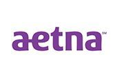 The aetna logo is purple and white on a white background.