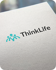 A close up of a thinklife logo on a piece of paper