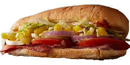 A sub sandwich with lettuce , tomatoes , onions and peppers on a white background.