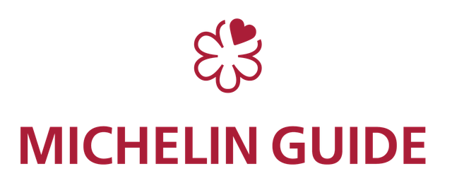 The michelin guide logo has a red flower with a heart on it.