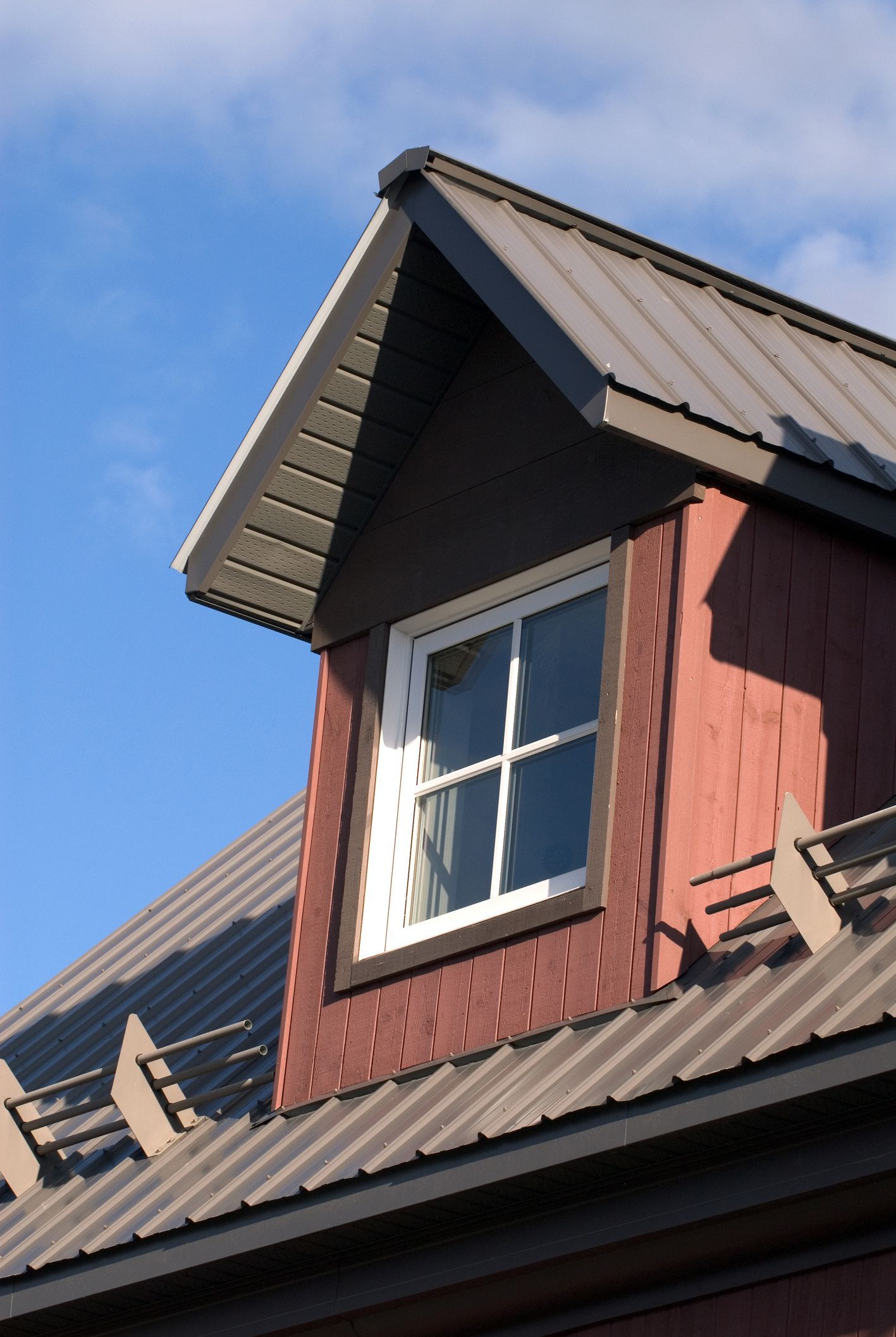 A roof with a window on top of it