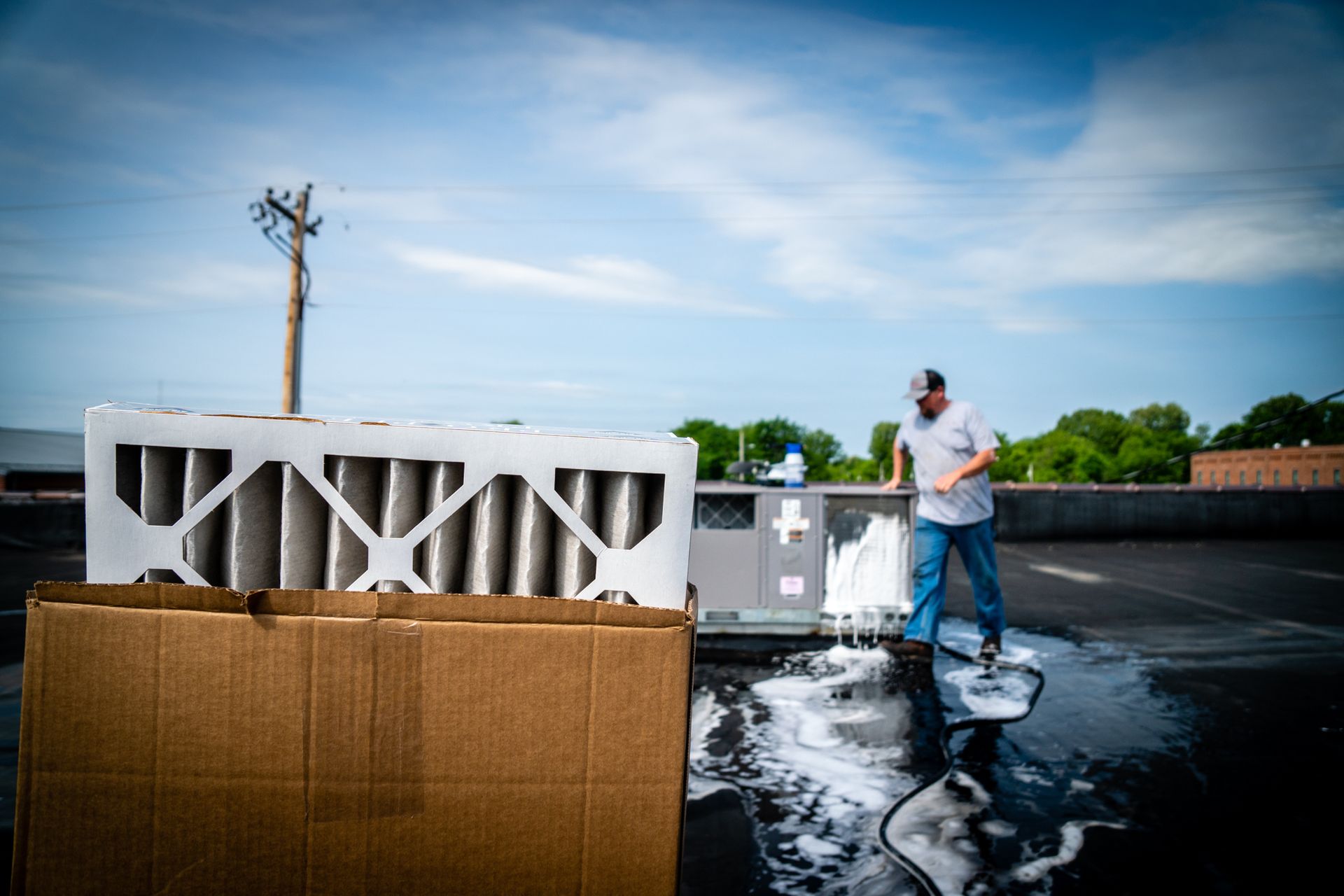 HVAC Tech servicing an HVAC unit