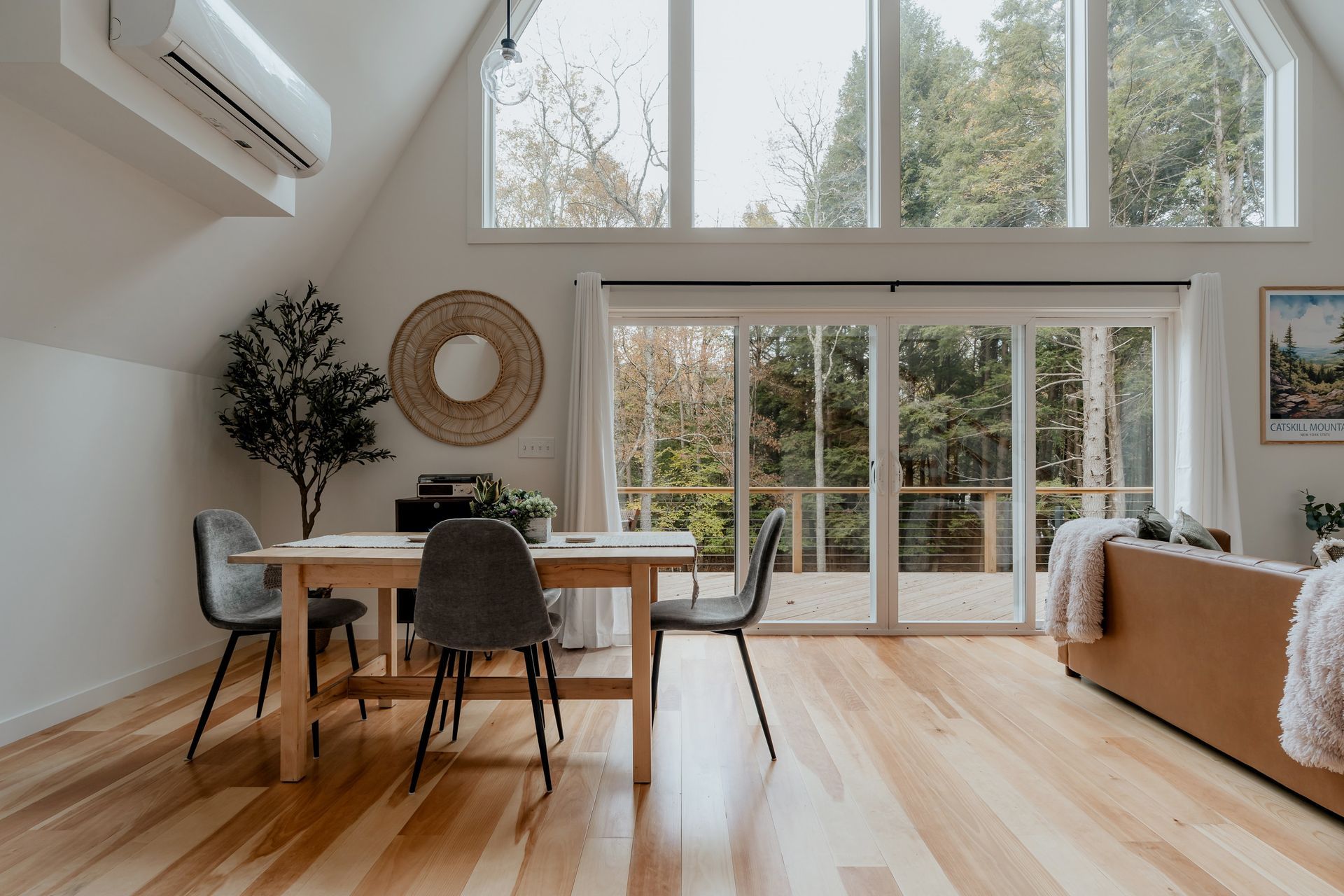 Interior of a modern house with contemporary furniture and hardwood floor.