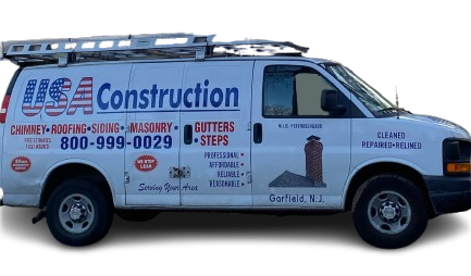 White USA Construction van with ladder rack, phone number, and chimney graphic in Scofield, NJ.