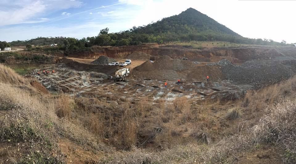 Open Pit Mine With Workers, Brown and Gray Earth — The Caves Quarry CQ in The Caves, QLD