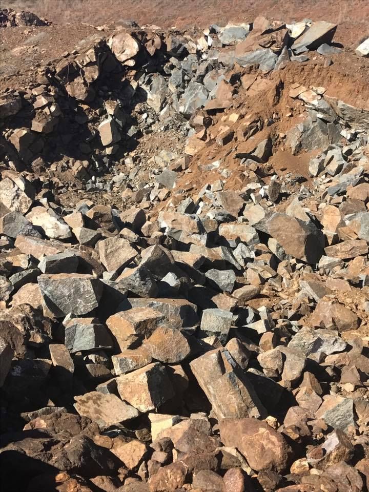 Pile of Gray Gravel Against a Clear Blue Sky — The Caves Quarry CQ in The Caves, QLD
