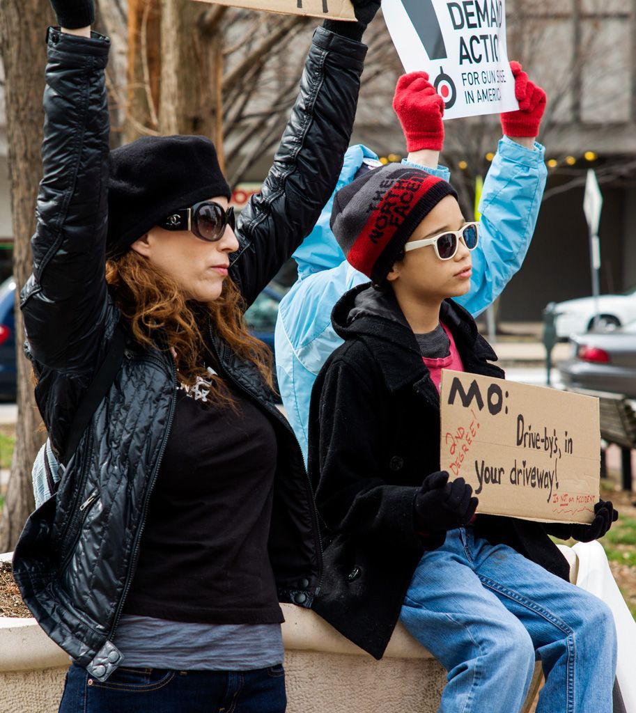 This mom brought her son to the protest demanding action by both the Missouri State legislature and local law enforcement after their neighborhood had been plagued by drive by shootings recently. Photographed March 30, 2013.
