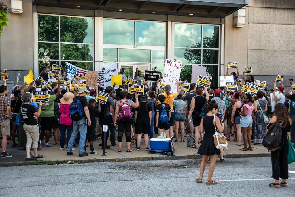 The Workhouse, one of two jails in St. Louis City for many years, was known for its inhumane conditions. It was a medium security institution without air conditioning or adequate heating for inmates. The name “Workhouse” was derived as detainees were sentenced to forced labor when they could not afford to pay their fines, Later detainees were incarcerated there due to their inability to afford unconstitutionally high cash bail. Most inmates were awaiting trial caged and criminalized due to their poverty. This protest to Close The Workhouse was held in downtown St. Louis during the annual July 4 parade to call attention to the abhorrent existence of this type of jail. Photographed July 4, 2018. 