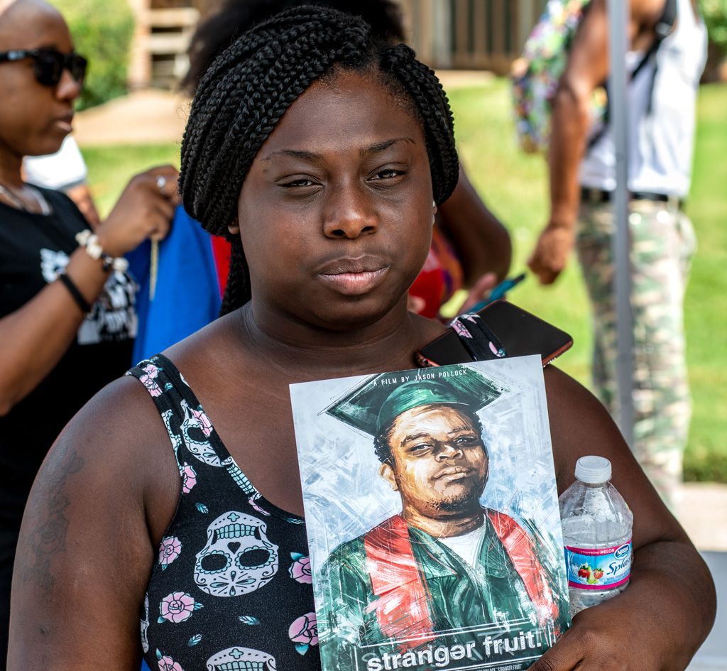 At the annual memorial commemorating the 4th anniversary of Michael Brown’s death, this woman, among hundreds of others, gathered to pay their respects to a life lost way too early for all the wrong reasons. The death of Michael Brown, Jr. in Ferguson, Missouri, spawned the Black Lives Matter movement in the United Sates. Michael had just graduated from high school a few months before his death. Photographed on August 9, 2018.