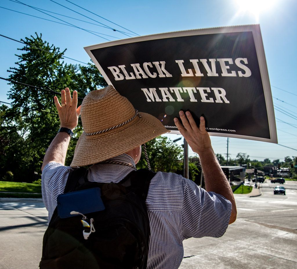 In the St. Louis suburb of Richmond Heights, police escalation of a shoplifting event turned deadly with the shooting of a 23-year old black man, Terry Tilman. The events that unfolded were suspicious and ultimately pointed to excessive force by the police as the frightened man ran, only to be gunned down. It took 20 months for video to be released by the police that cast doubt on the officer’s story. Black Lives Matter protesters were at the Richmond Heights City Hall to call attention to this tragedy on a hot summer day as shown above. Photographed September 5, 2019.  