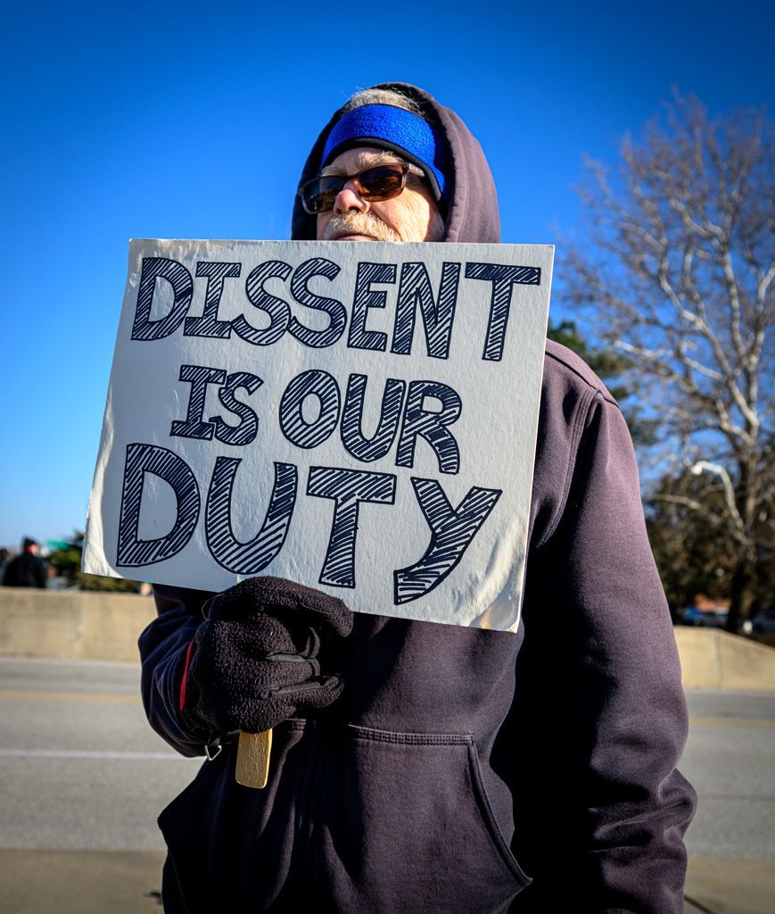 The Free America Walkout occurred nationwide on January 20, 2026 at 2 p.m., one year after Donald Trump took the oath of office for his second term in the White House. For most Americans it was a year of chaos, turmoil, disappointment, frustration, and agony as they witnessed the decline of democracy and a rise in authoritarianism. This gentleman at the Tamm Avenue overpass above I-64 in St. Louis, Missouri, with his sign, proclaimed one key aspect about our tenuous First Amendment rights as ICE and other entities threaten its existence under the Trump regime. 