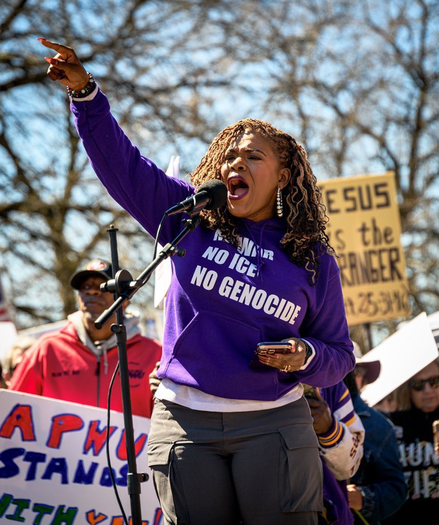 Cori Bush, candidate for re-election to the House of Representatives in Missouri’s First Congressional District, spoke at the protest and used a traditional Maasai greeting, “And how are the children?,” to emphasize how the Trump administration continues to ignore the will of the people, affordability, civil rights, and the health of our nation to favor the rich getting richer. Photographed March 28, 2026. 