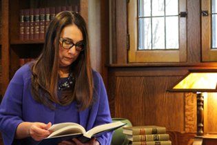 Attorney Aimee Is Reading Book - Grosse Pointe Farms, MI - Dodson Fowler Williams & Nesi