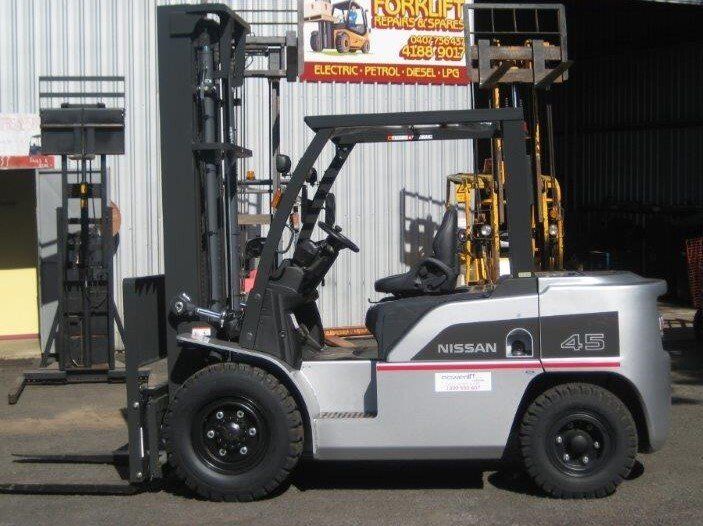 Man Driving Forklift Truck On A Warehouse — Forklift Services In Bundaberg, QLD