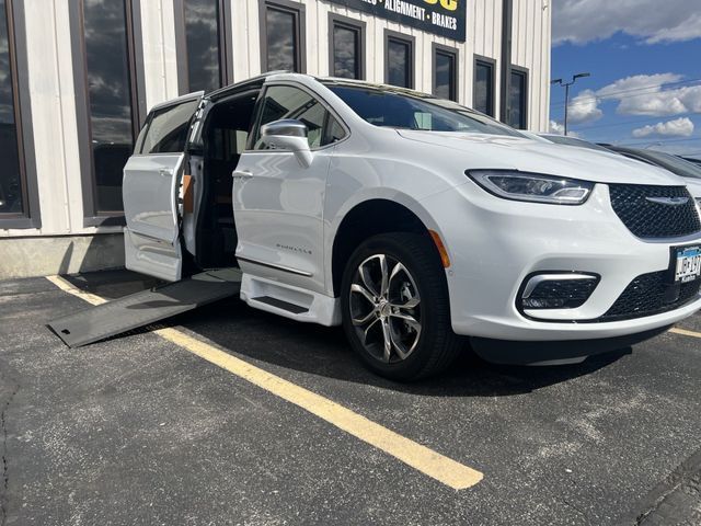 A White Minivan with a Handicap Ramp is Parked in a Parking Lot | Rochester and Austin, MN | Kuehn Rental