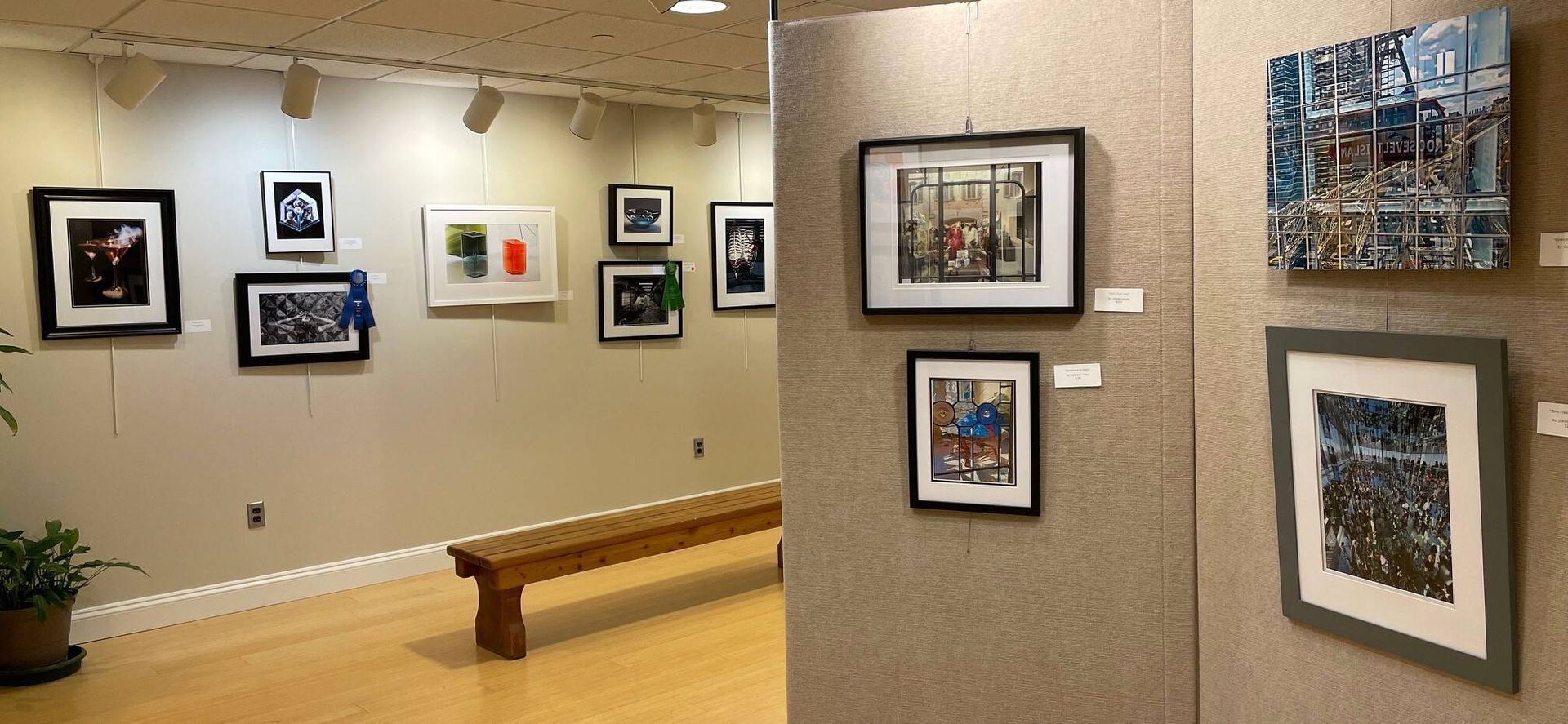 Hands playing a wooden piano.
