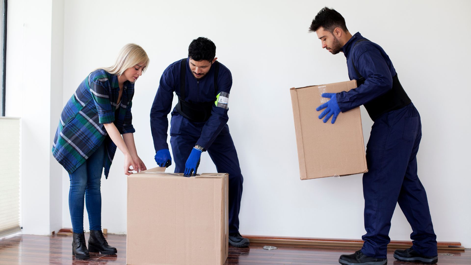 moving company crew packing items